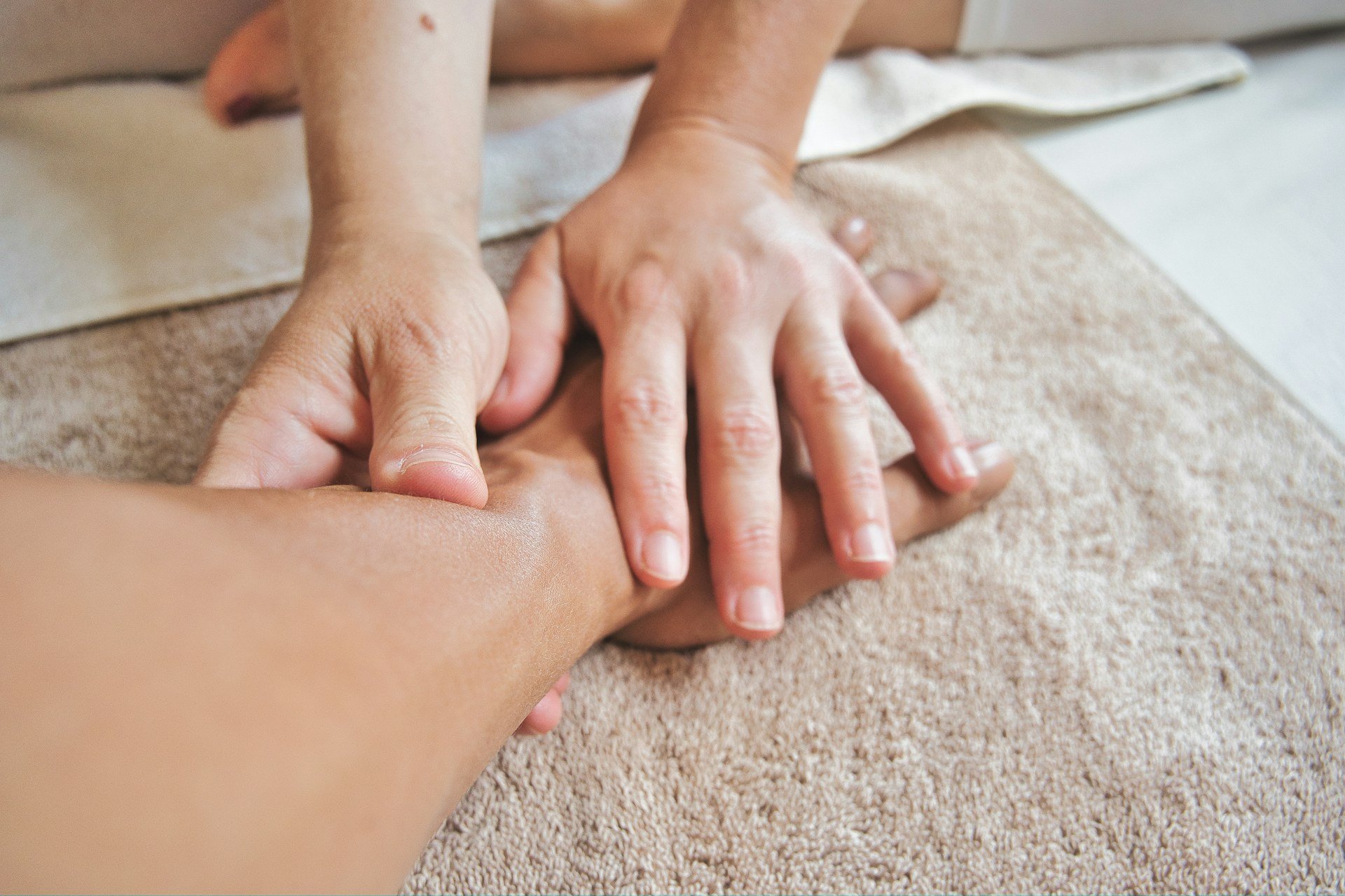 Close-up of arthritis hand therapy during an occupational therapy session