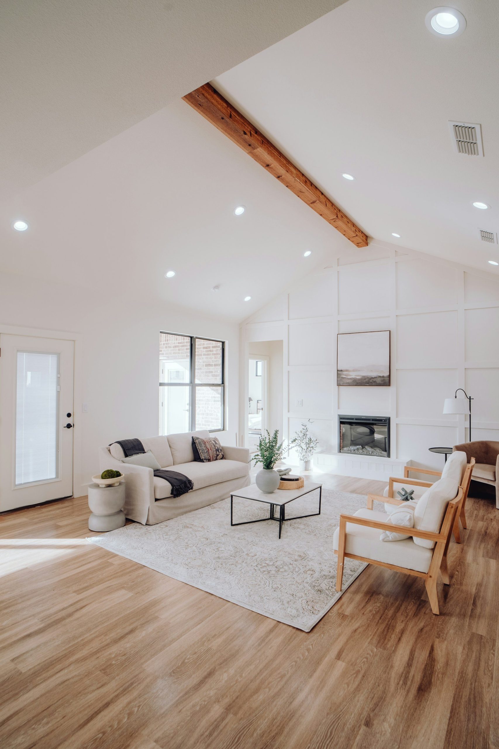 Bright open living room with clear flooring, an example of accessible NDIS housing