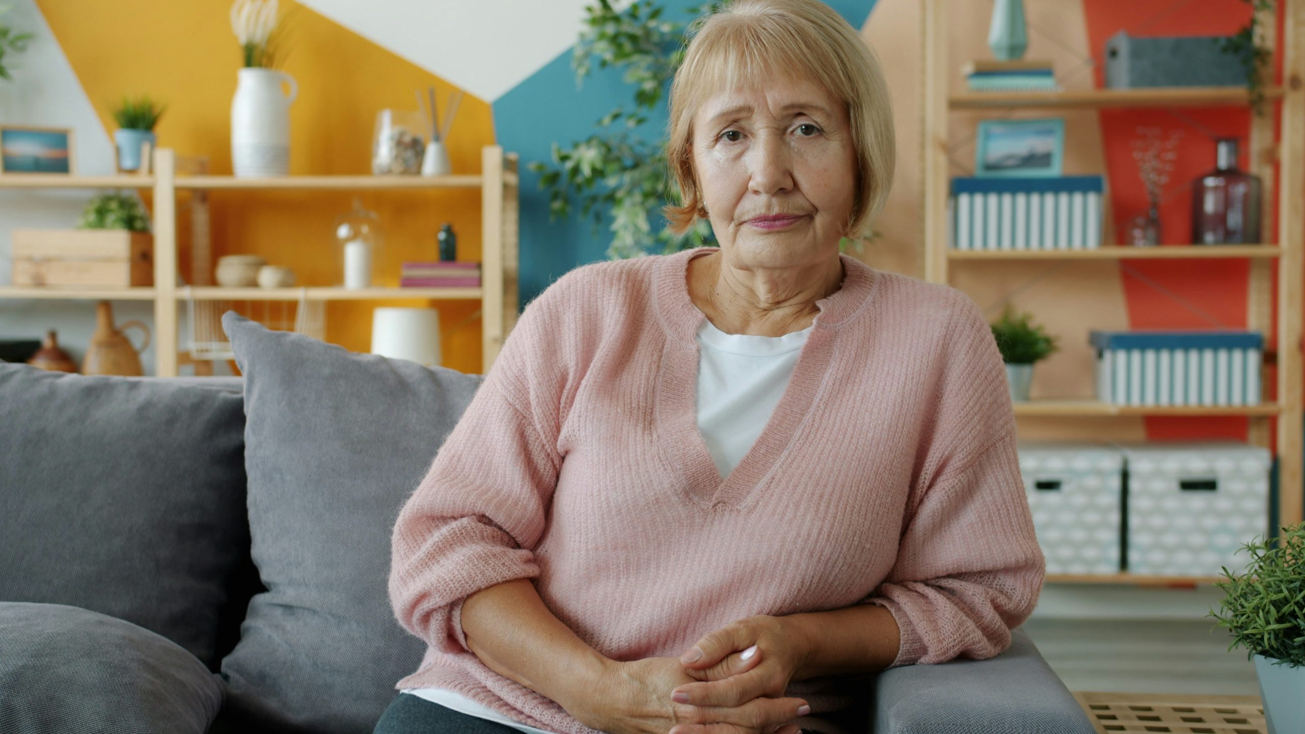 Older woman sitting in her living room, the kind of home setting an occupational therapist in Lismore visits for a mobile assessment