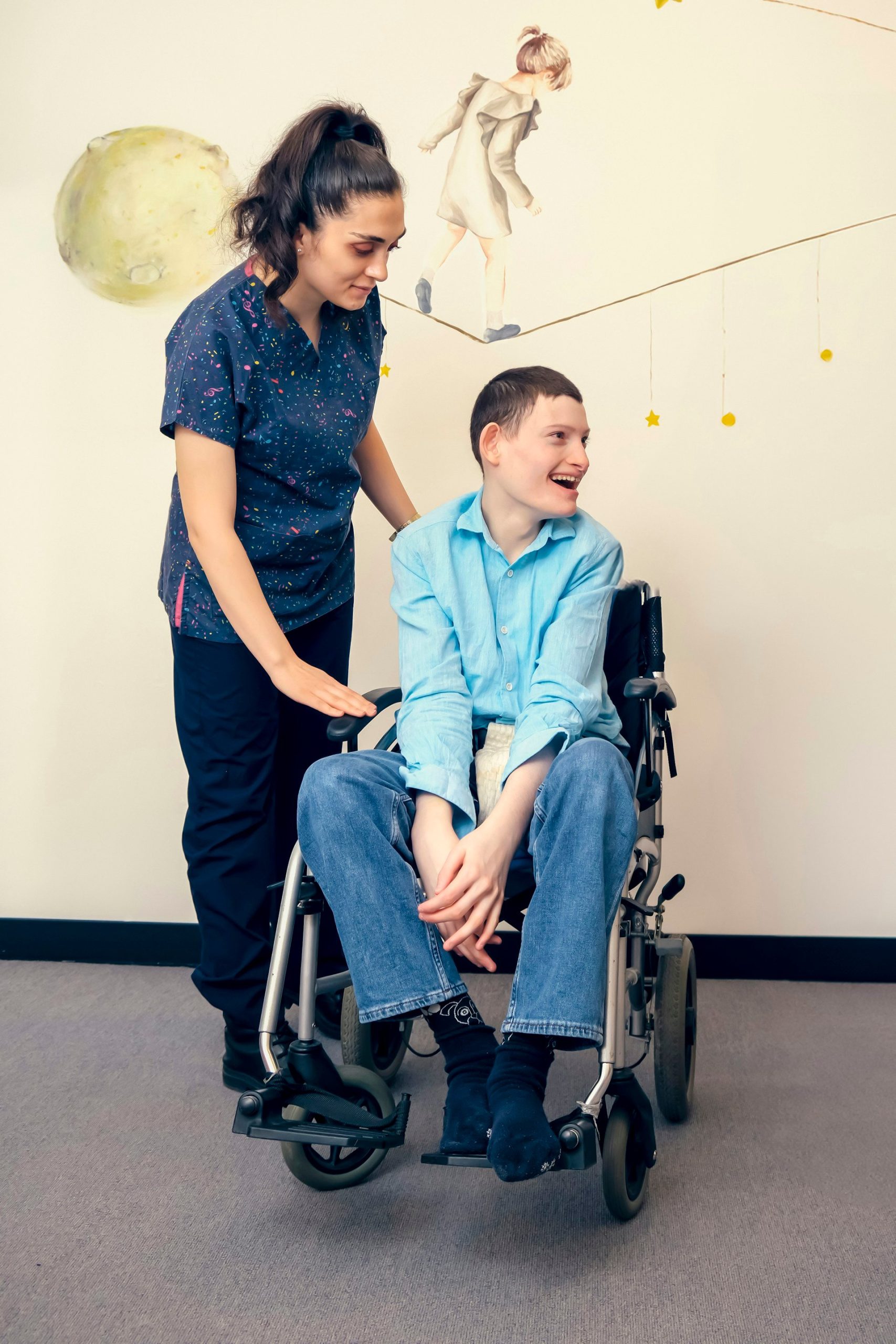 Occupational therapist with a wheelchair user during a mobility equipment assessment